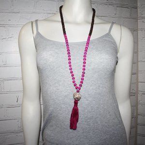 Beautiful wooden and pink beaded necklace with tassel 34"